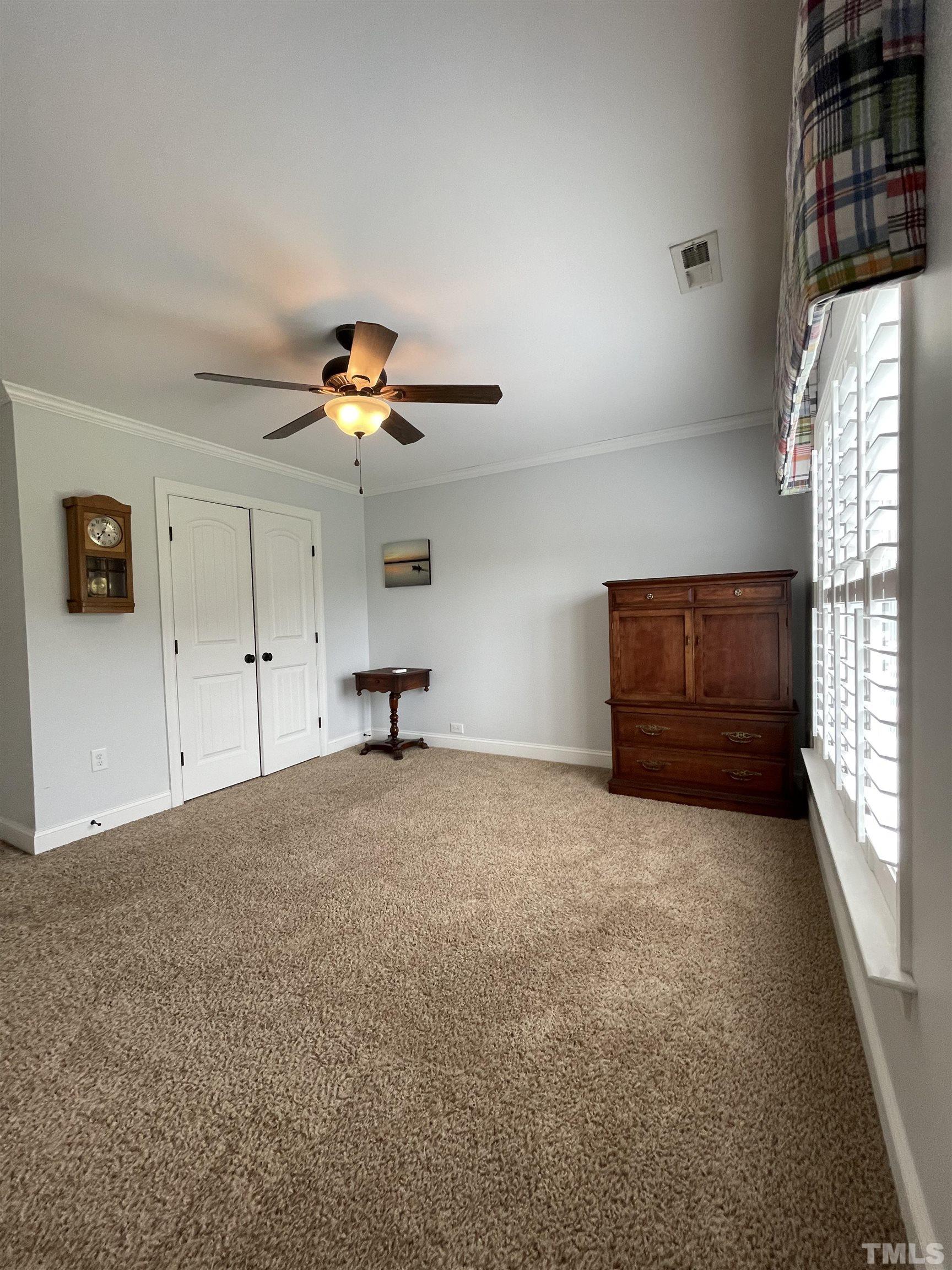6228 Mitchell Mill Road Zebulon, NC 27597 - Photo 42 of 51 a view of an empty room with a window