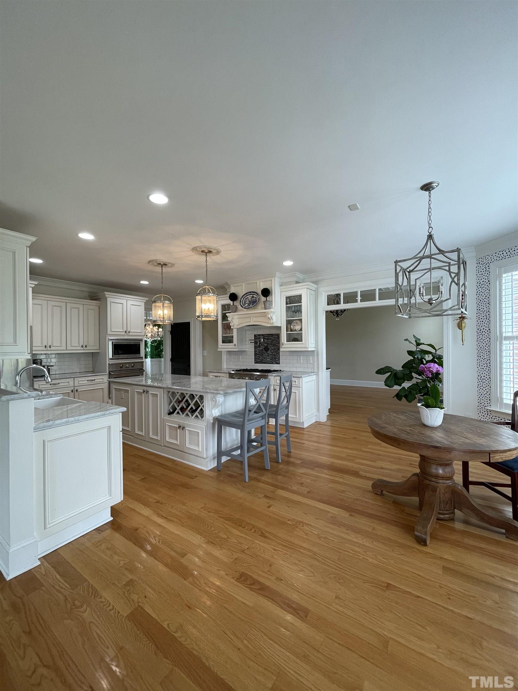 6228 Mitchell Mill Road Zebulon, NC 27597 - Photo 8 of 51 a living room with furniture and a table