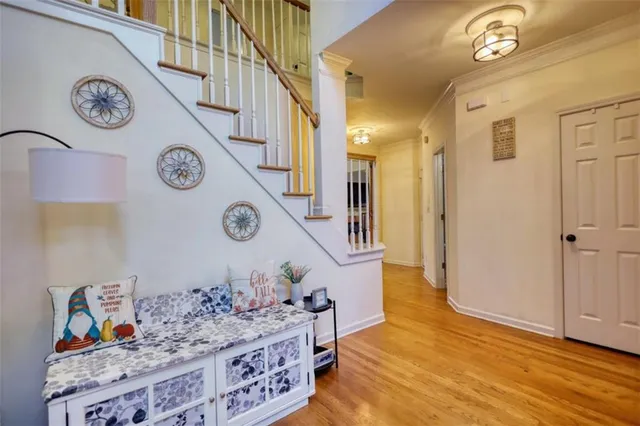 a room with furniture and a flat screen tv