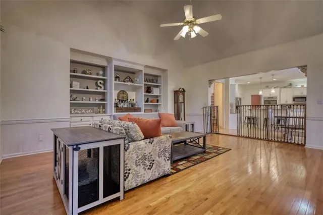 a white toilet sitting next to a bathroom sink and tub