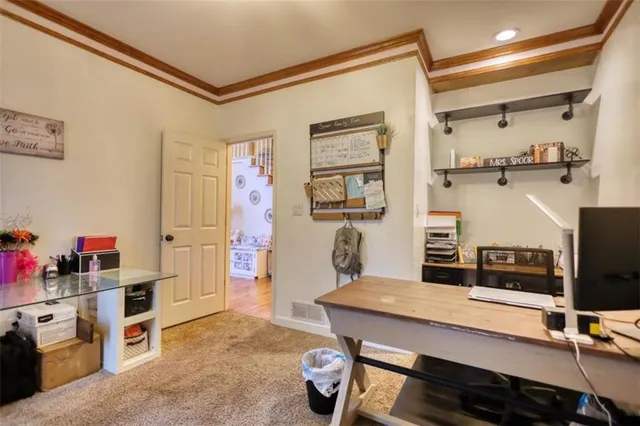 a bathroom with a sink mirror vanity and toilet