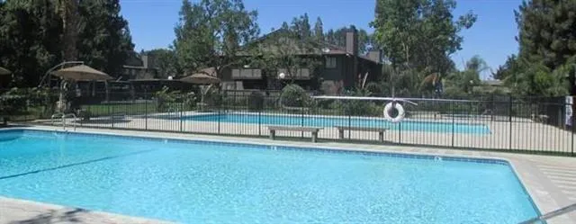 a view of outdoor space with swimming pool