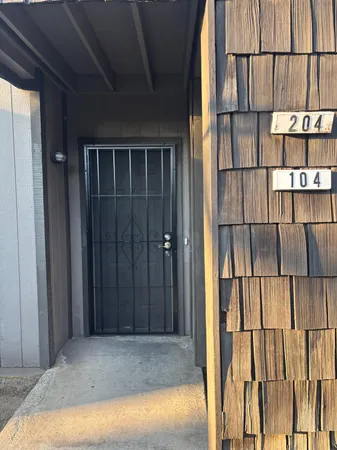 a view of a city street with cars