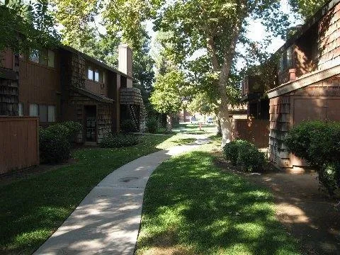 a view of street with houses and trees