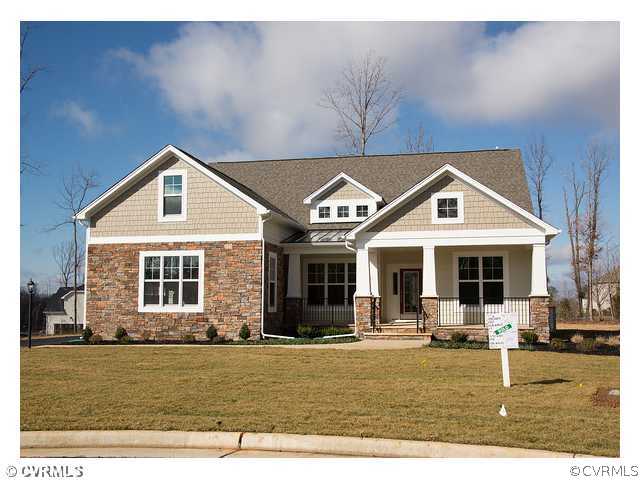 1246 Coalfield Road Midlothian, VA 23114 - Photo 1 of 5 a front view of a house with garden