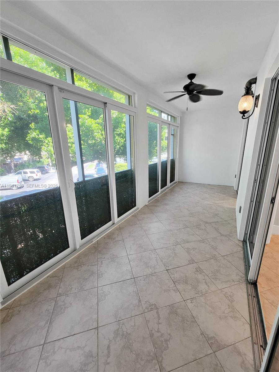 75 Gulfstream Road, Unit 211B Dania Beach, FL 33004 - Photo 44 of 57 a view of an empty room with a window