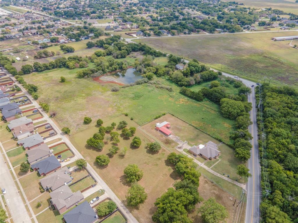 1333 West Wintergreen Road Lancaster, TX 75134 - Photo 2 of 3 an aerial view of a residential houses with outdoor space