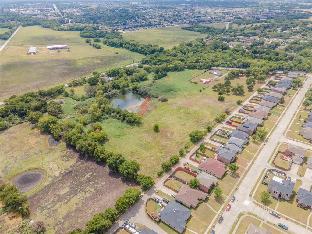 1333 West Wintergreen Road Lancaster, TX 75134 - Photo 3 of 3 an aerial view of residential houses with outdoor space