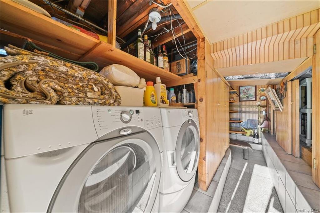 44 Cove Road Warwick, NY 10990 - Photo 11 of 22 a view of walk in closet with clothes and shoes