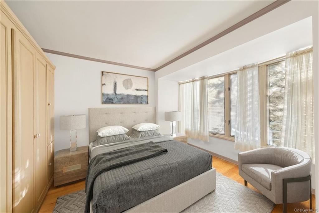 44 Cove Road Warwick, NY 10990 - Photo 12 of 22 a bedroom with a bed and glass window