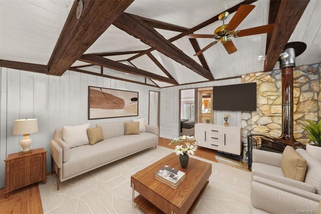 44 Cove Road Warwick, NY 10990 - Photo 13 of 22 a living room with furniture and a flat screen tv