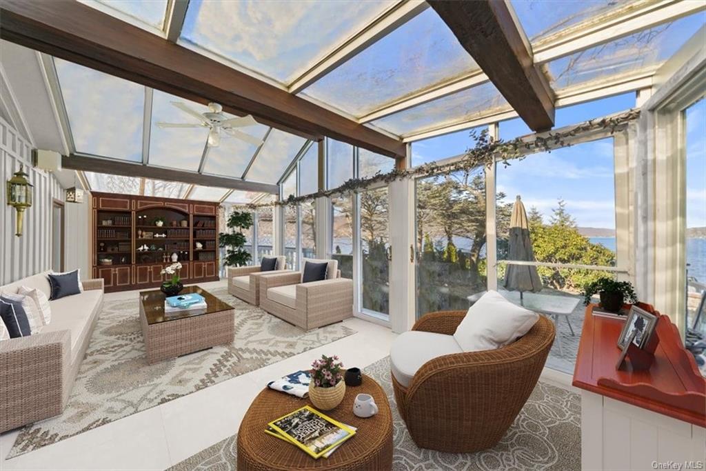 44 Cove Road Warwick, NY 10990 - Photo 14 of 22 a living room filled with furniture and a large window