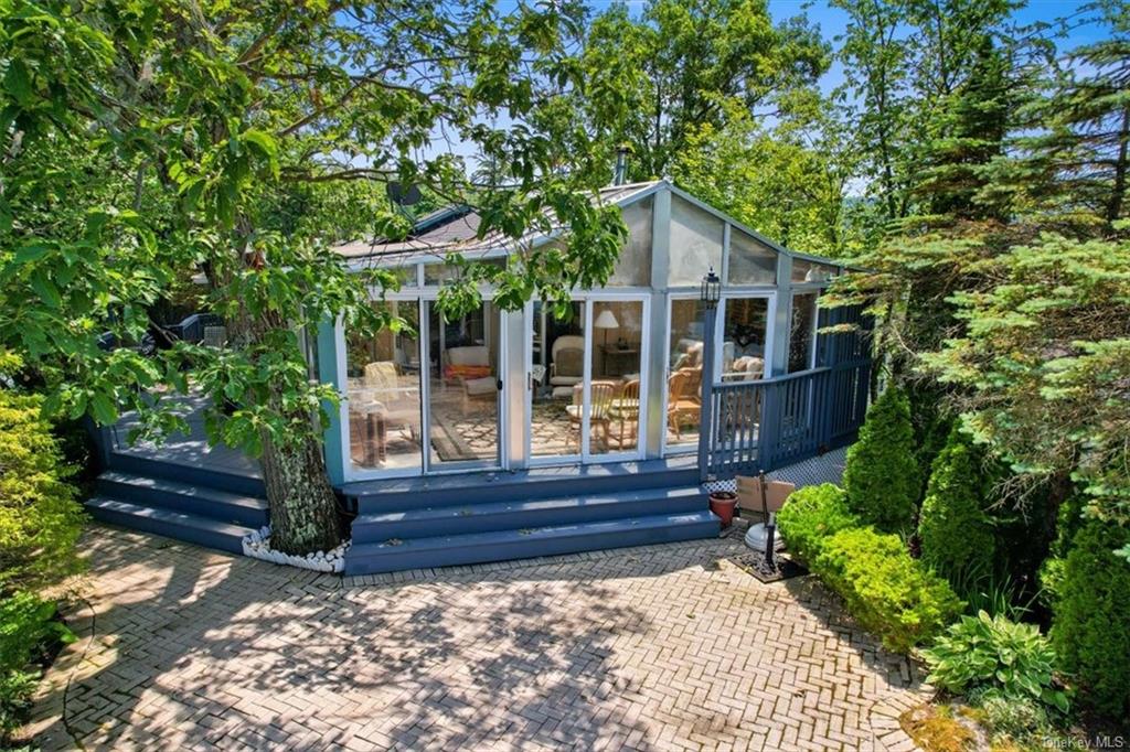 44 Cove Road Warwick, NY 10990 - Photo 16 of 22 a view of a house with backyard and sitting area
