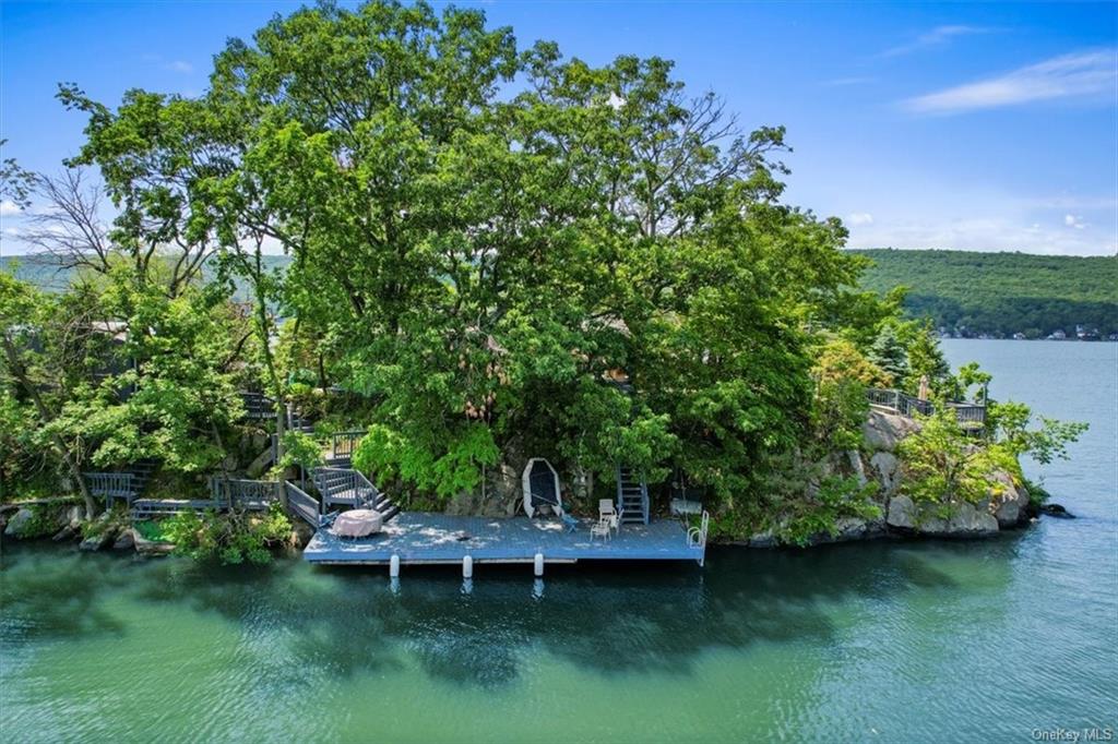 44 Cove Road Warwick, NY 10990 - Photo 20 of 22 a view of a backyard with plants and a garden