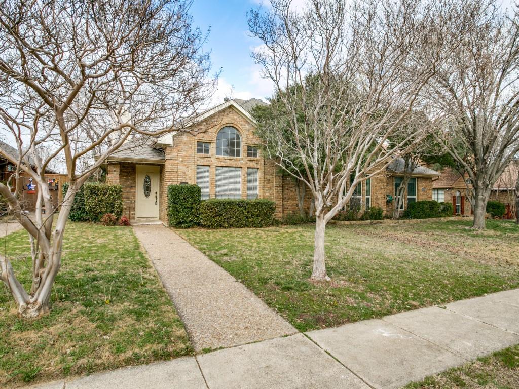 2827 Monet Place Dallas, TX 75287 - Photo 1 of 1 a front view of a house with yard