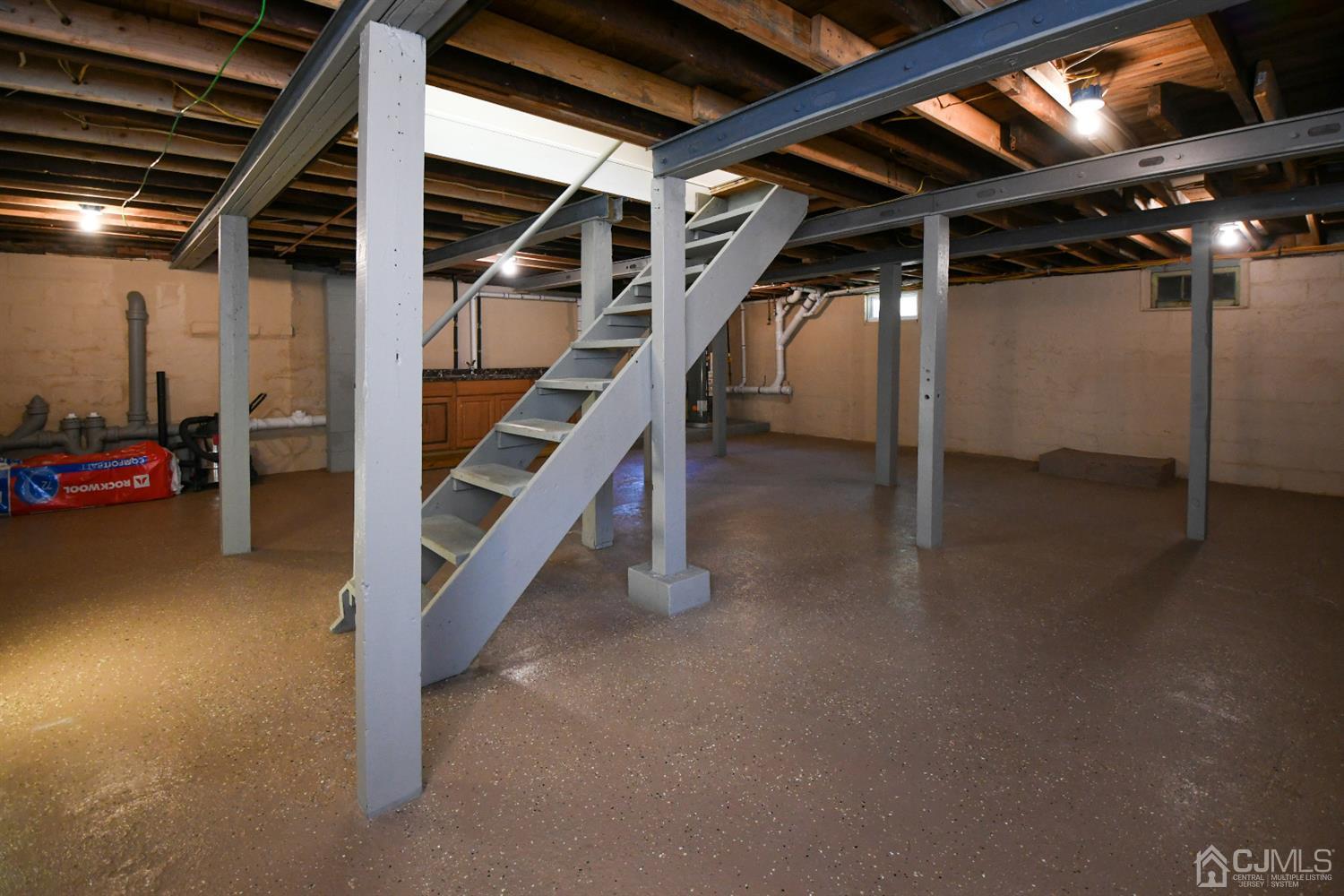 15 Brookside Road Spotswood, NJ 08884 - Photo 41 of 42 a view of an empty room with stairs