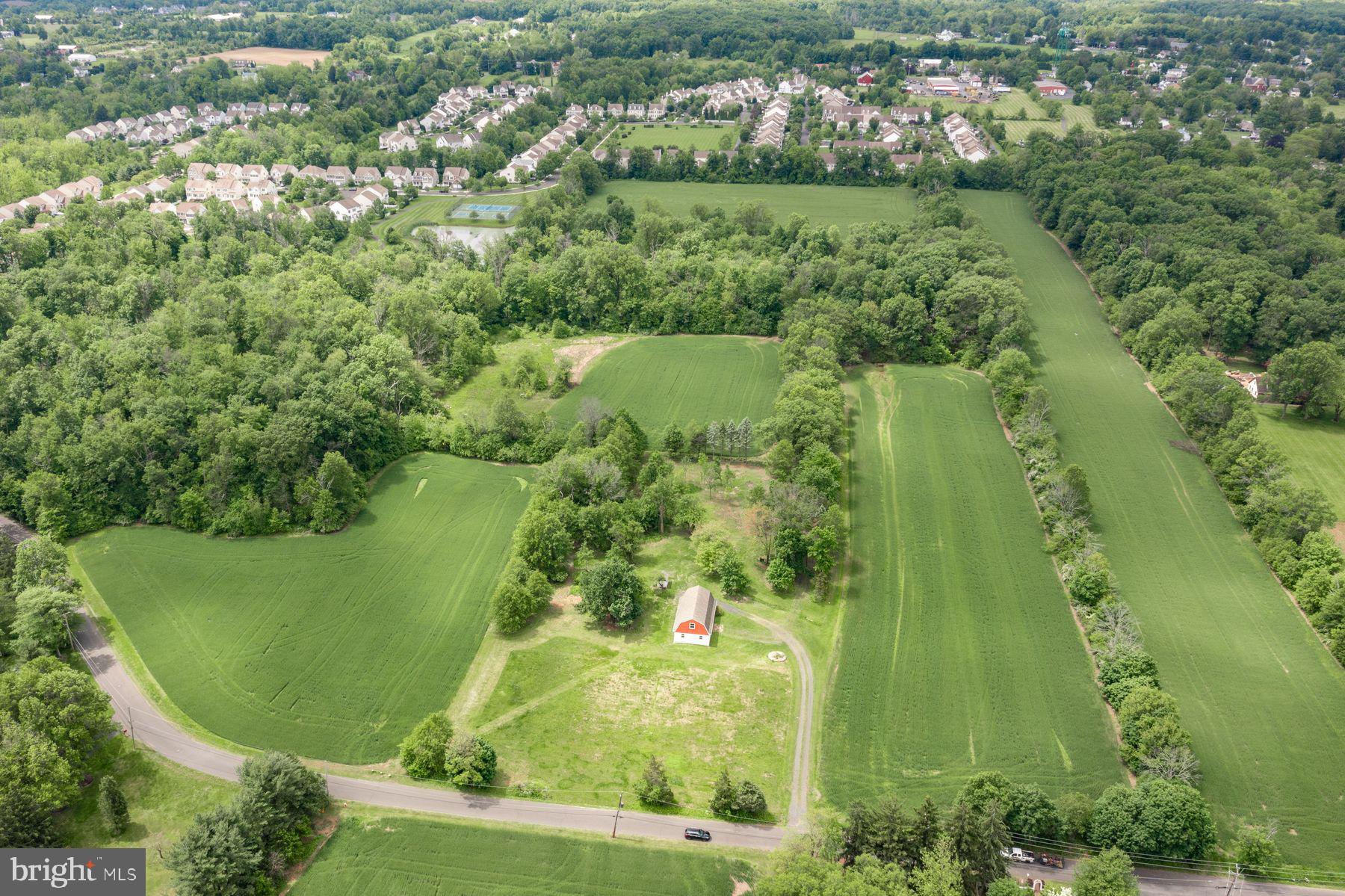 108 Smith School Road Perkasie, PA 18944 - Photo 5 of 12 an aerial view of a residential houses with outdoor space and trees all around
