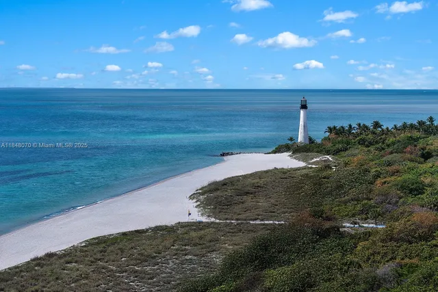 a view of a lake with a yard