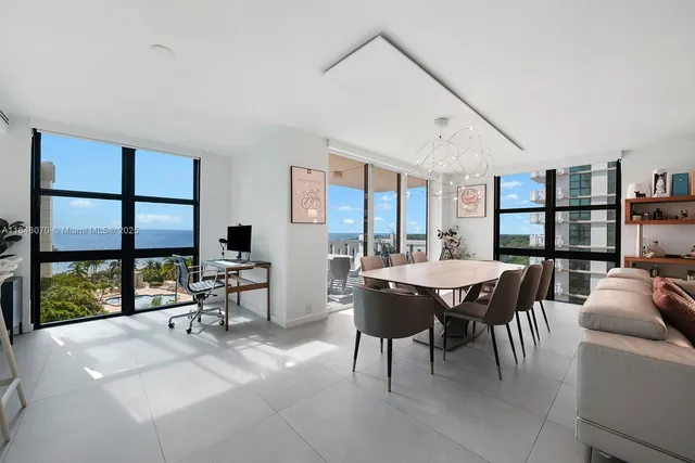a view of a livingroom with furniture and window