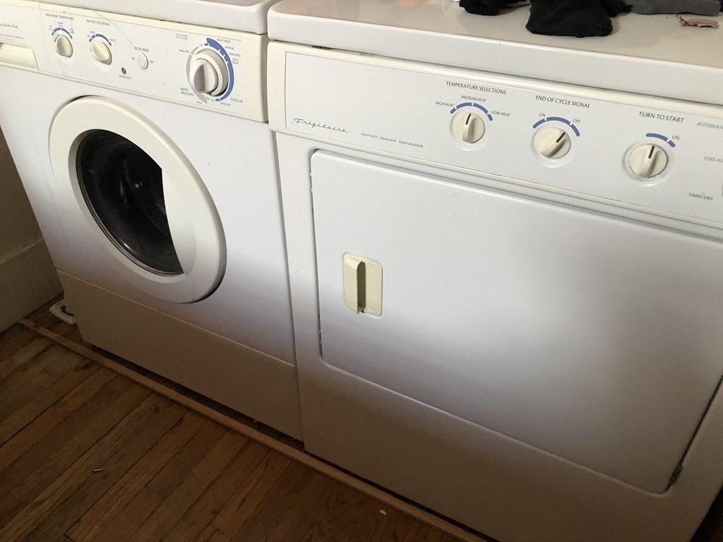 68 Boylston Street, Unit 4 Brookline, MA 02445 - Photo 7 of 12 a utility room with dryer and washer