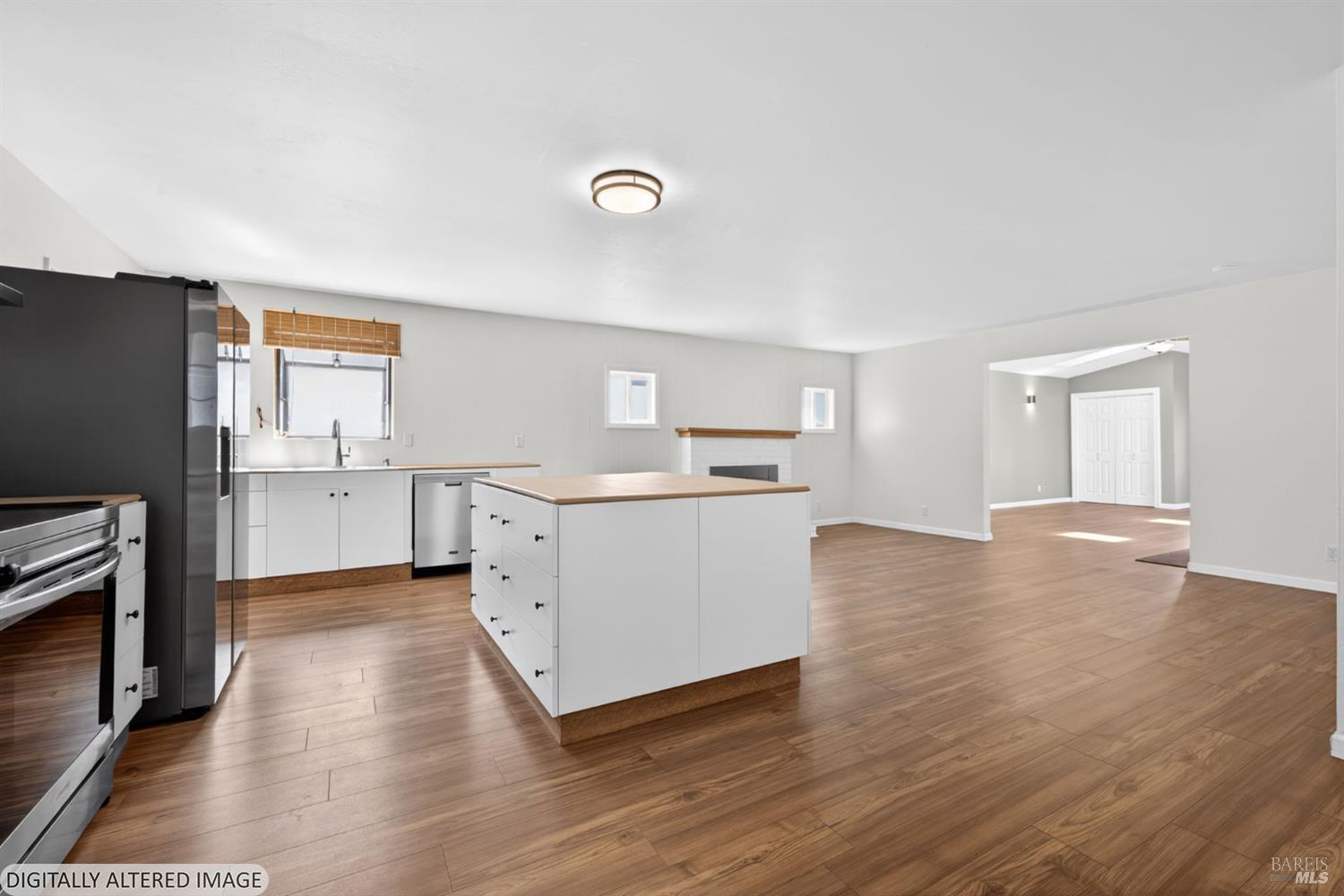 7517 Bernice Avenue Rohnert Park, CA 94928 - Photo 6 of 45 Room off of family room has green walls.