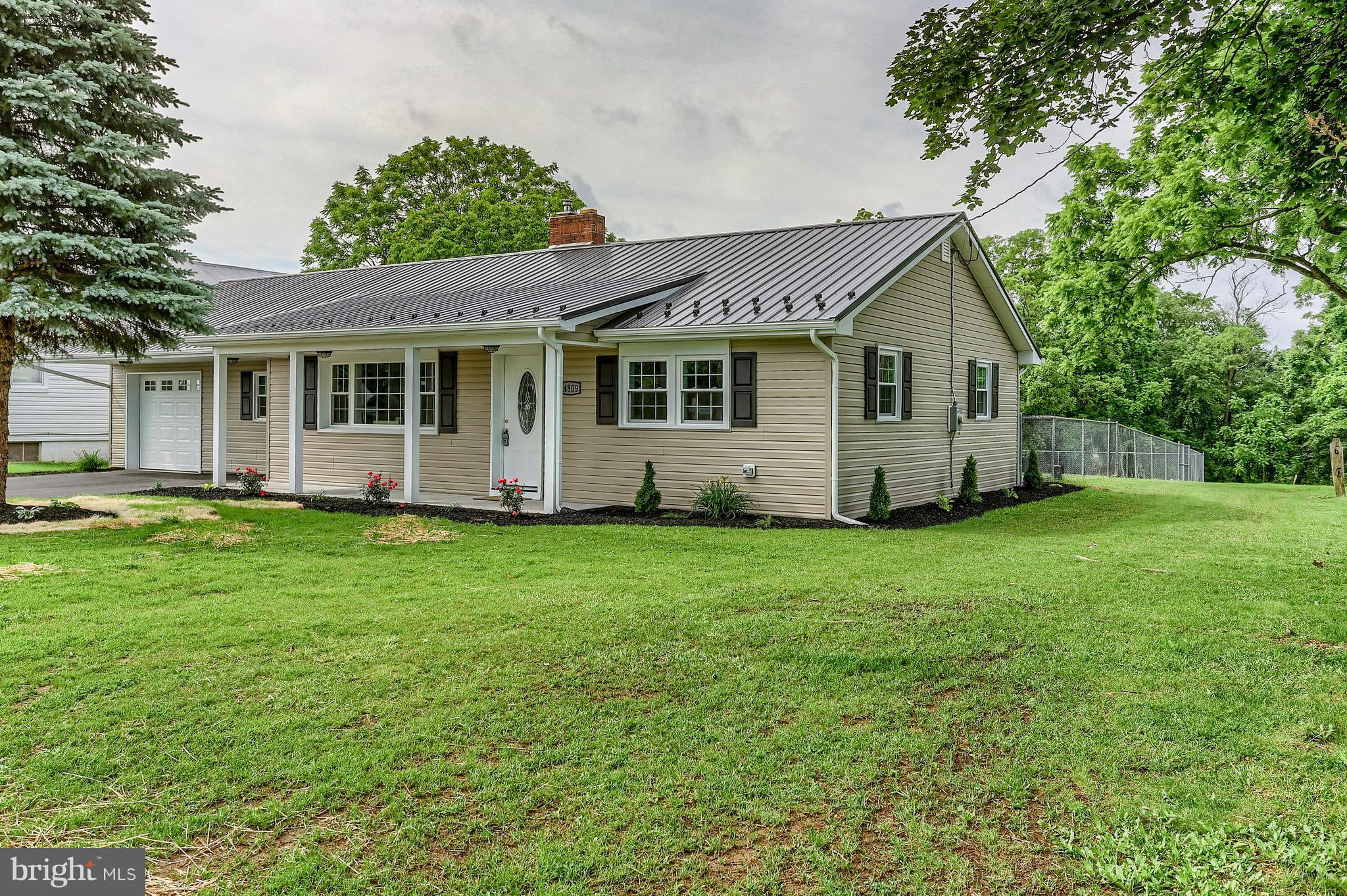 14809 Clear Spring Road Williamsport, MD 21795 - Photo 1 of 27 a view of a house with yard