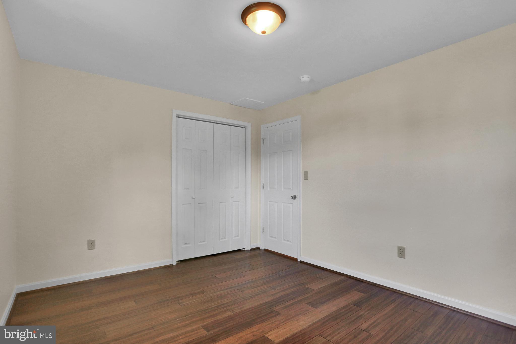 14809 Clear Spring Road Williamsport, MD 21795 - Photo 13 of 27 a view of an empty room and wooden floor