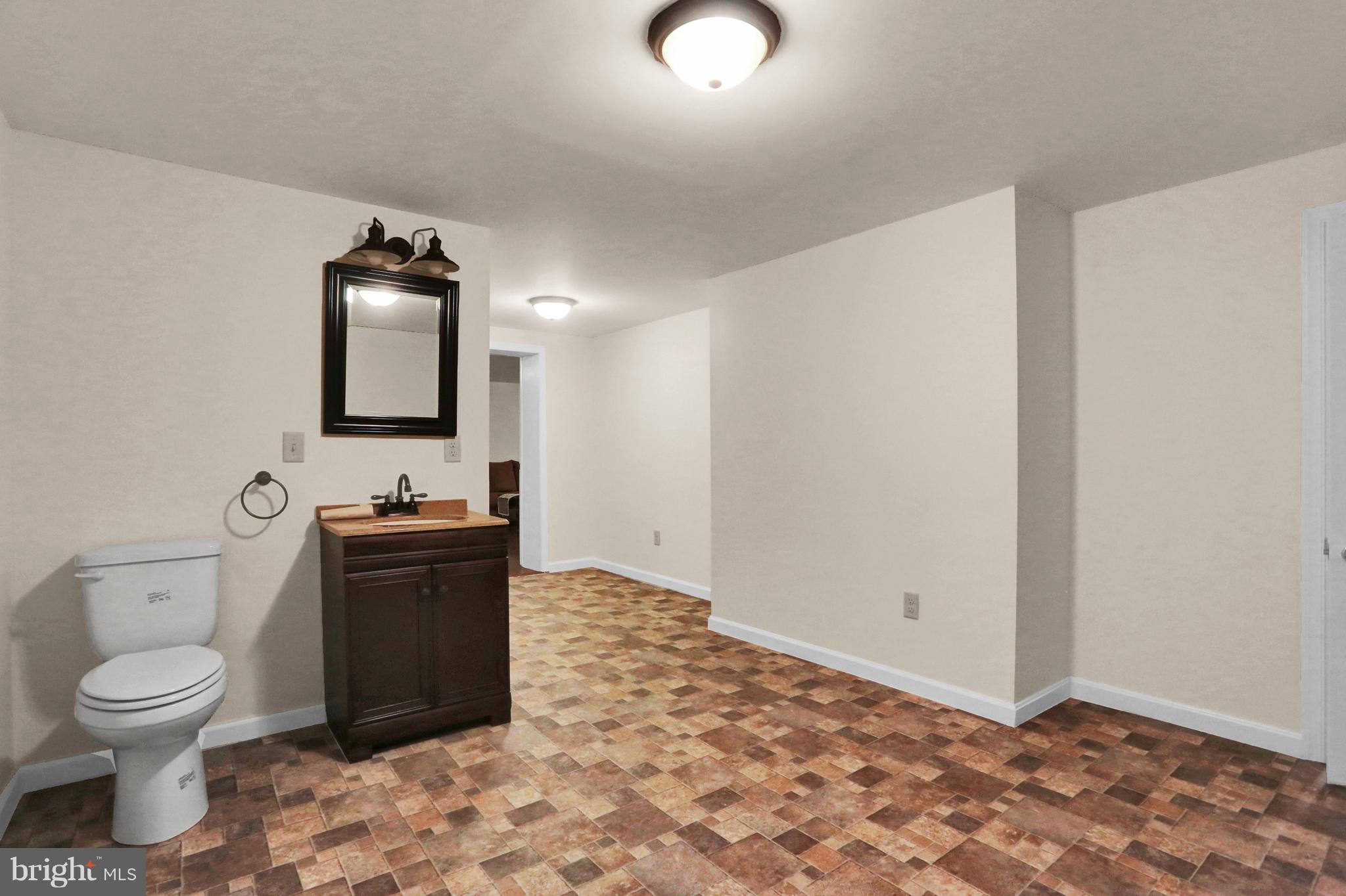 14809 Clear Spring Road Williamsport, MD 21795 - Photo 20 of 27 a bathroom with a toilet