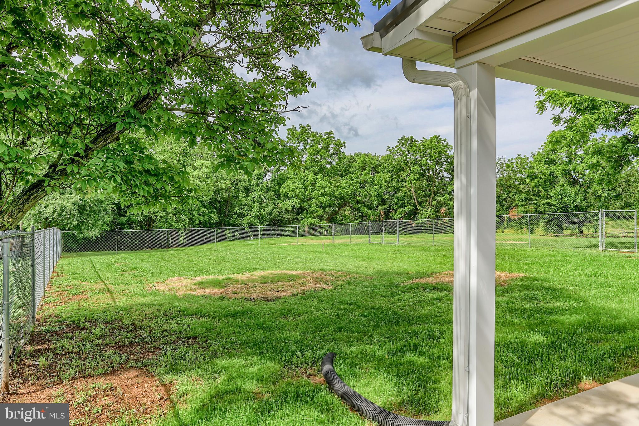 14809 Clear Spring Road Williamsport, MD 21795 - Photo 25 of 27 a view of a backyard with a garden