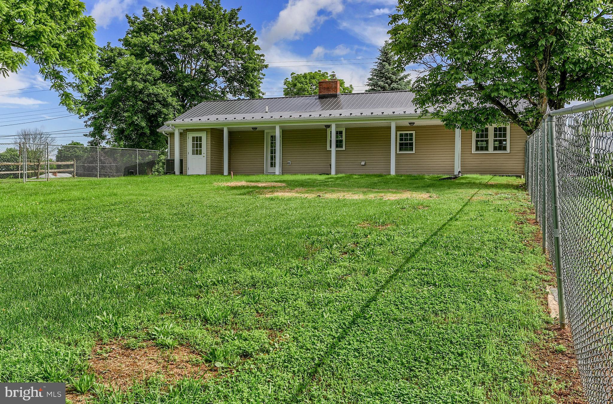 14809 Clear Spring Road Williamsport, MD 21795 - Photo 27 of 27 a view of an house with backyard space and garden
