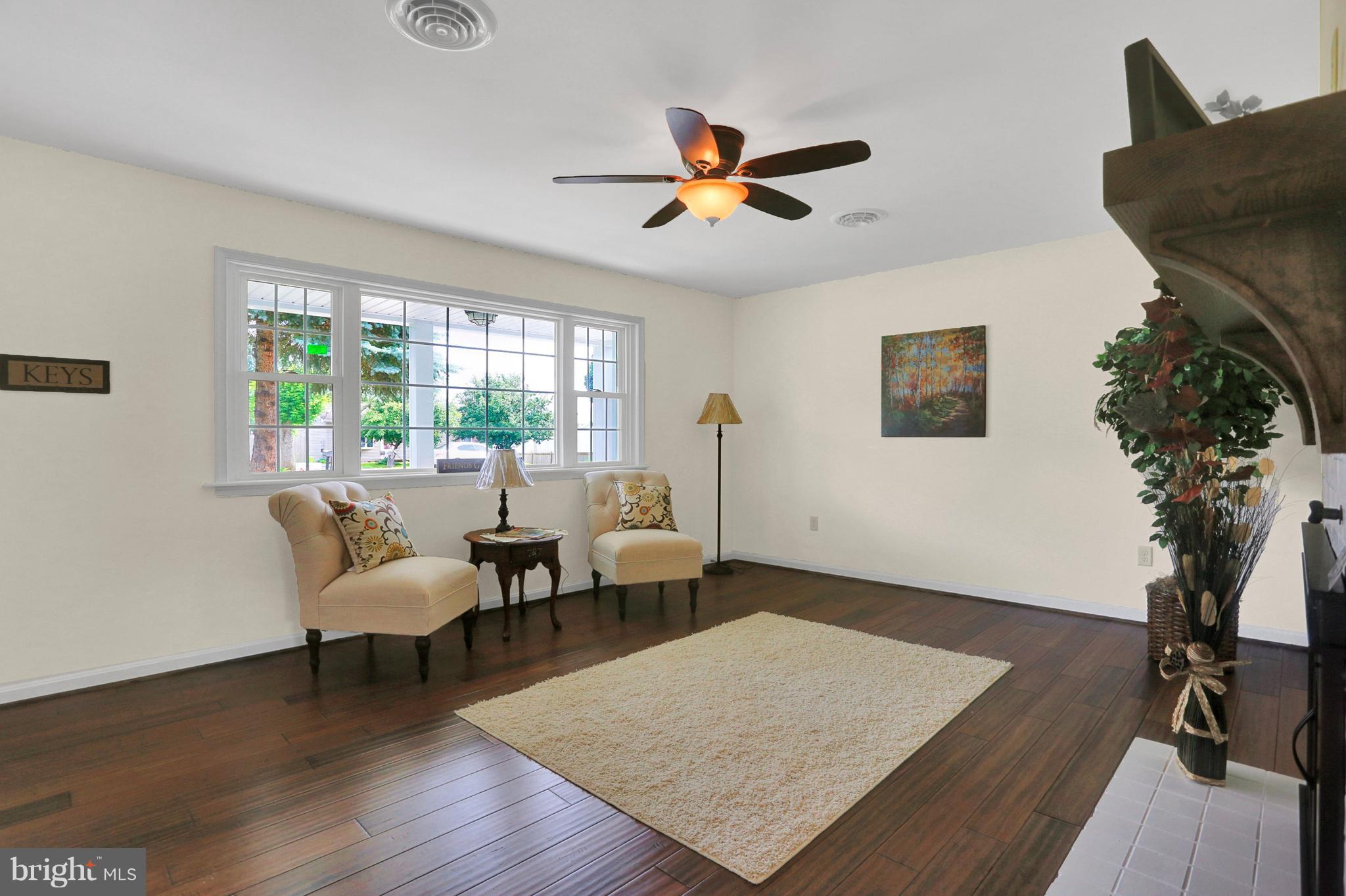 14809 Clear Spring Road Williamsport, MD 21795 - Photo 6 of 27 a living room with furniture and a potted plant