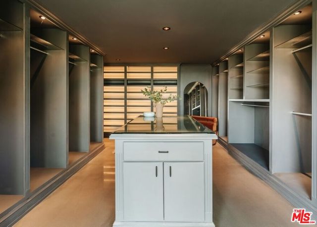 a room with a bed and a window