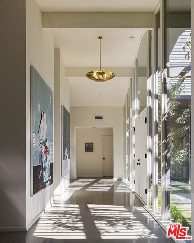 a view of a hallway with the front door