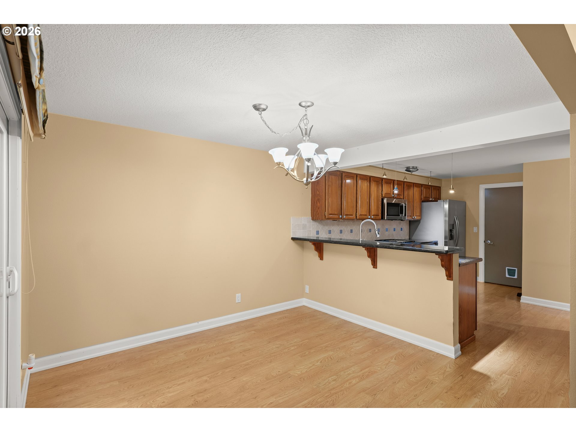 7859 Southwest Raintree Drive Beaverton, OR 97008 - Photo 11 of 24 Kitchen/Dining Room