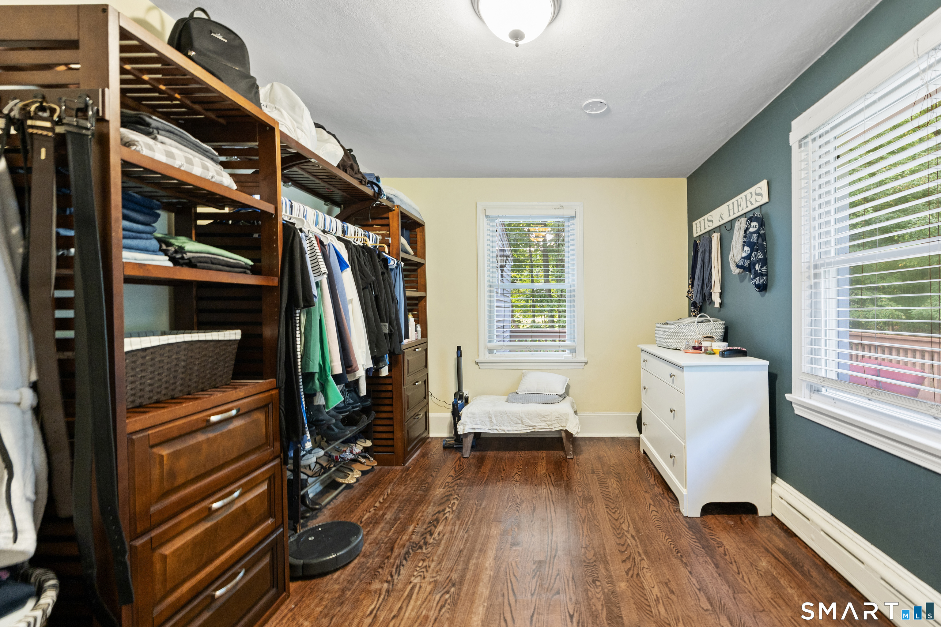 282 Todd Road Wolcott, CT 06716 - Photo 13 of 30 Bedroom 3 with hardwood floors. Brown closet storage to be removed prior to closing.
