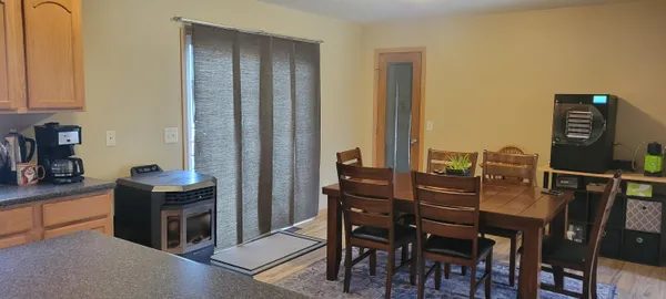a view of bedroom with wooden floor