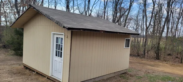 a view of a workspace with furniture