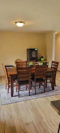 a kitchen with stainless steel appliances granite countertop a refrigerator a stove sink and cabinets