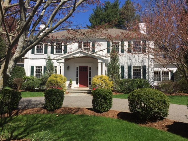 61 Hundreds Road Wellesley, MA 02481 - Photo 1 of 29 a front view of a house with a garden