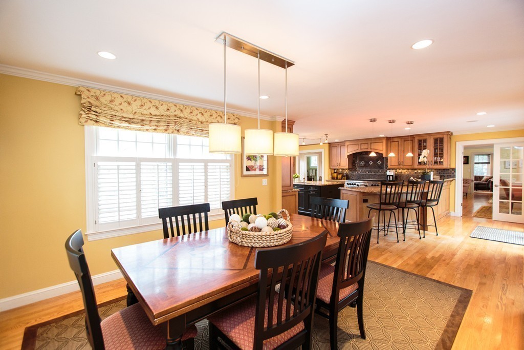 61 Hundreds Road Wellesley, MA 02481 - Photo 11 of 29 a view of a dining room with furniture window and wooden floor