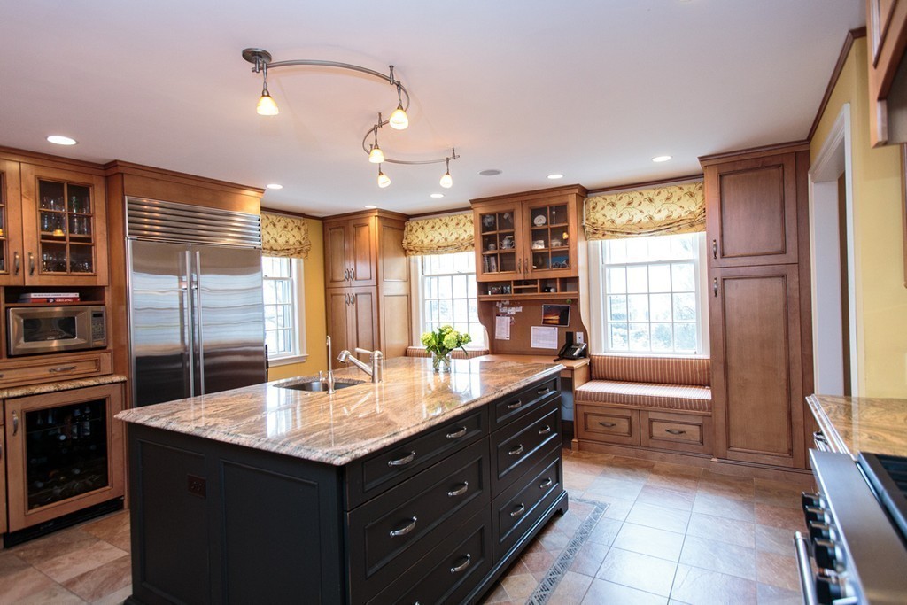 61 Hundreds Road Wellesley, MA 02481 - Photo 14 of 29 a kitchen with a stove a sink and a refrigerator