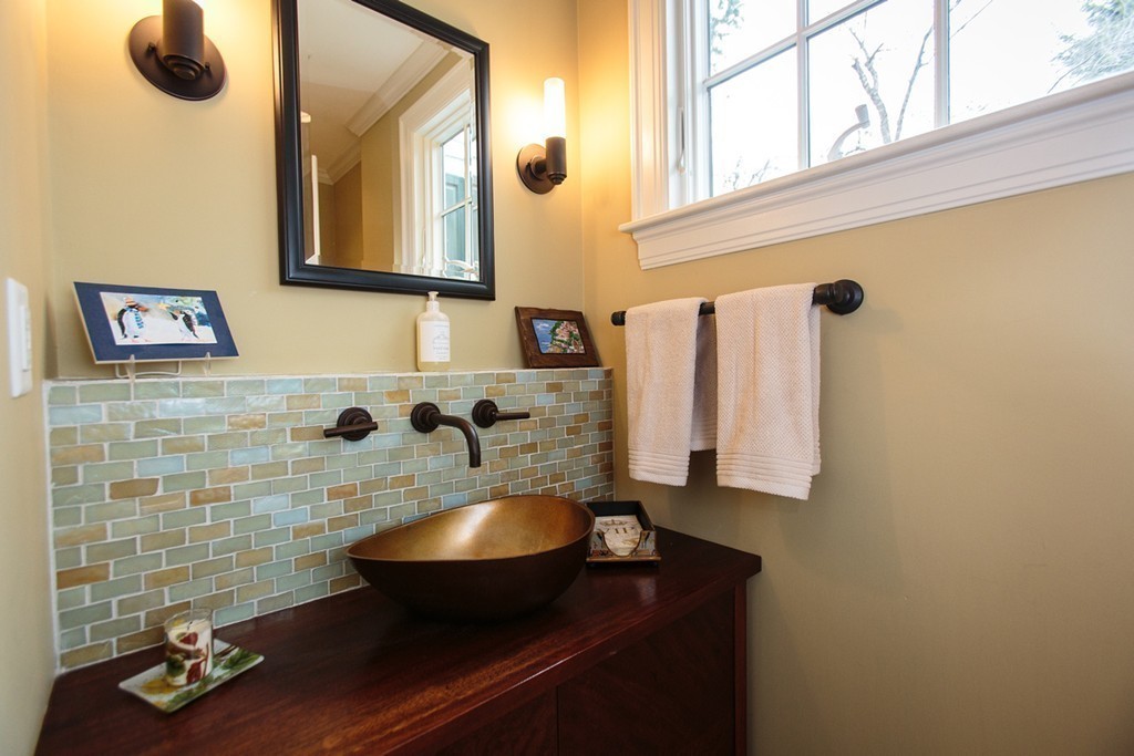 61 Hundreds Road Wellesley, MA 02481 - Photo 15 of 29 a bathroom with a sink and a mirror
