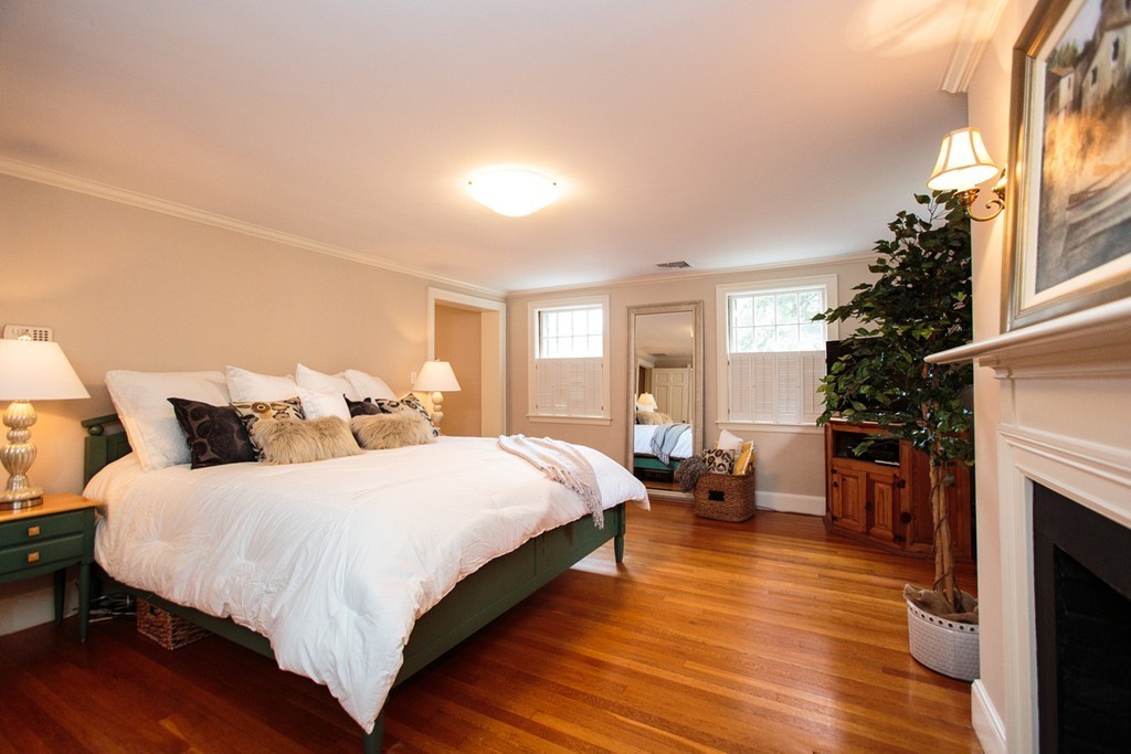 61 Hundreds Road Wellesley, MA 02481 - Photo 16 of 29 a bedroom with bed and wooden floor