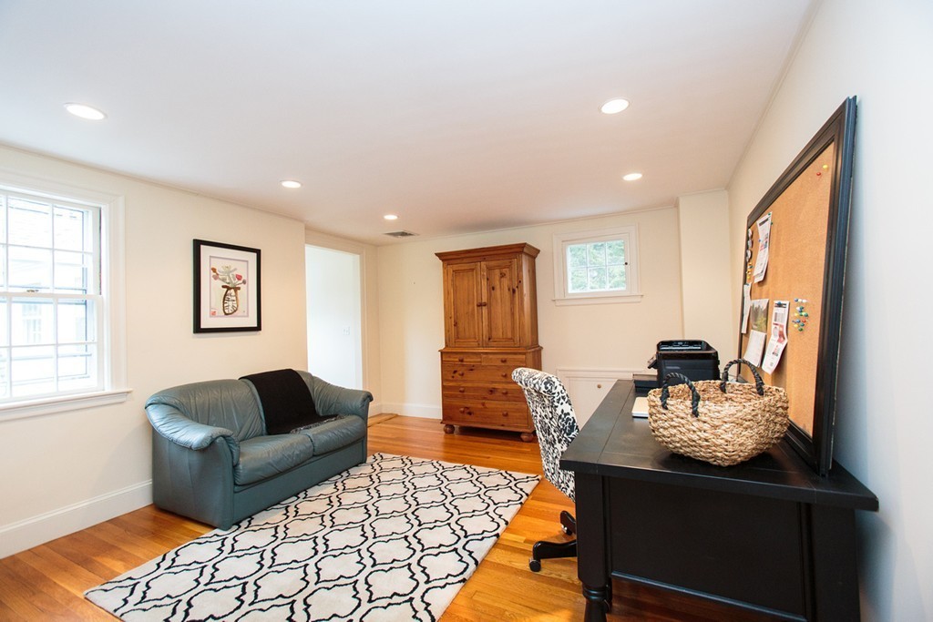 61 Hundreds Road Wellesley, MA 02481 - Photo 20 of 29 a living room with furniture and a couch