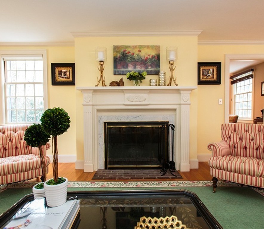 61 Hundreds Road Wellesley, MA 02481 - Photo 3 of 29 a living room with furniture and a fireplace
