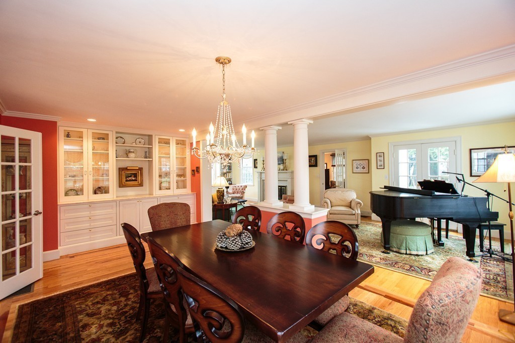 61 Hundreds Road Wellesley, MA 02481 - Photo 5 of 29 a view of a dining room with furniture