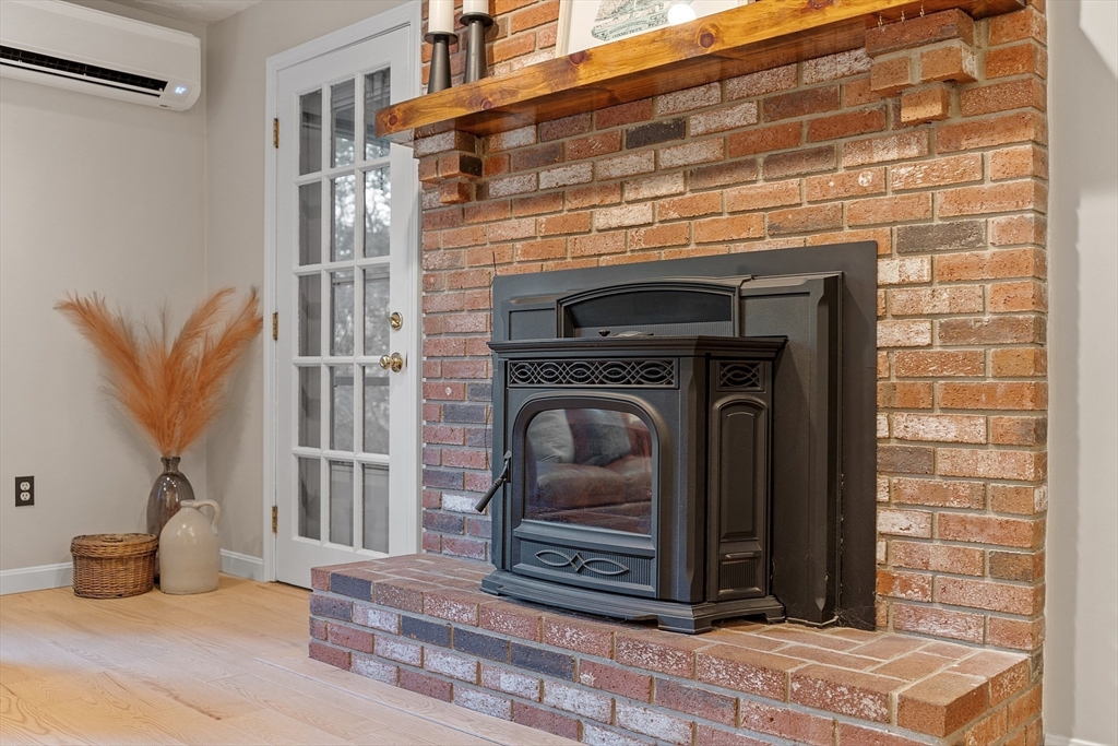 26 Bayberry Road Groton, MA 01450 - Photo 11 of 34 a close view of a fireplace in the room