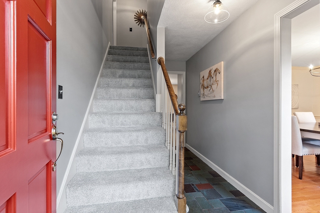 26 Bayberry Road Groton, MA 01450 - Photo 17 of 34 a view of staircase with white walls and white walls