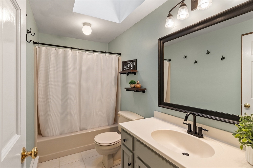 26 Bayberry Road Groton, MA 01450 - Photo 26 of 34 a bathroom with a sink toilet and shower