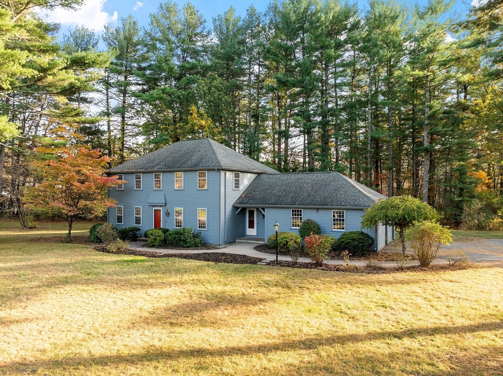 26 Bayberry Road Groton, MA 01450 - Photo 34 of 34 a house view with a swimming pool and outdoor seating